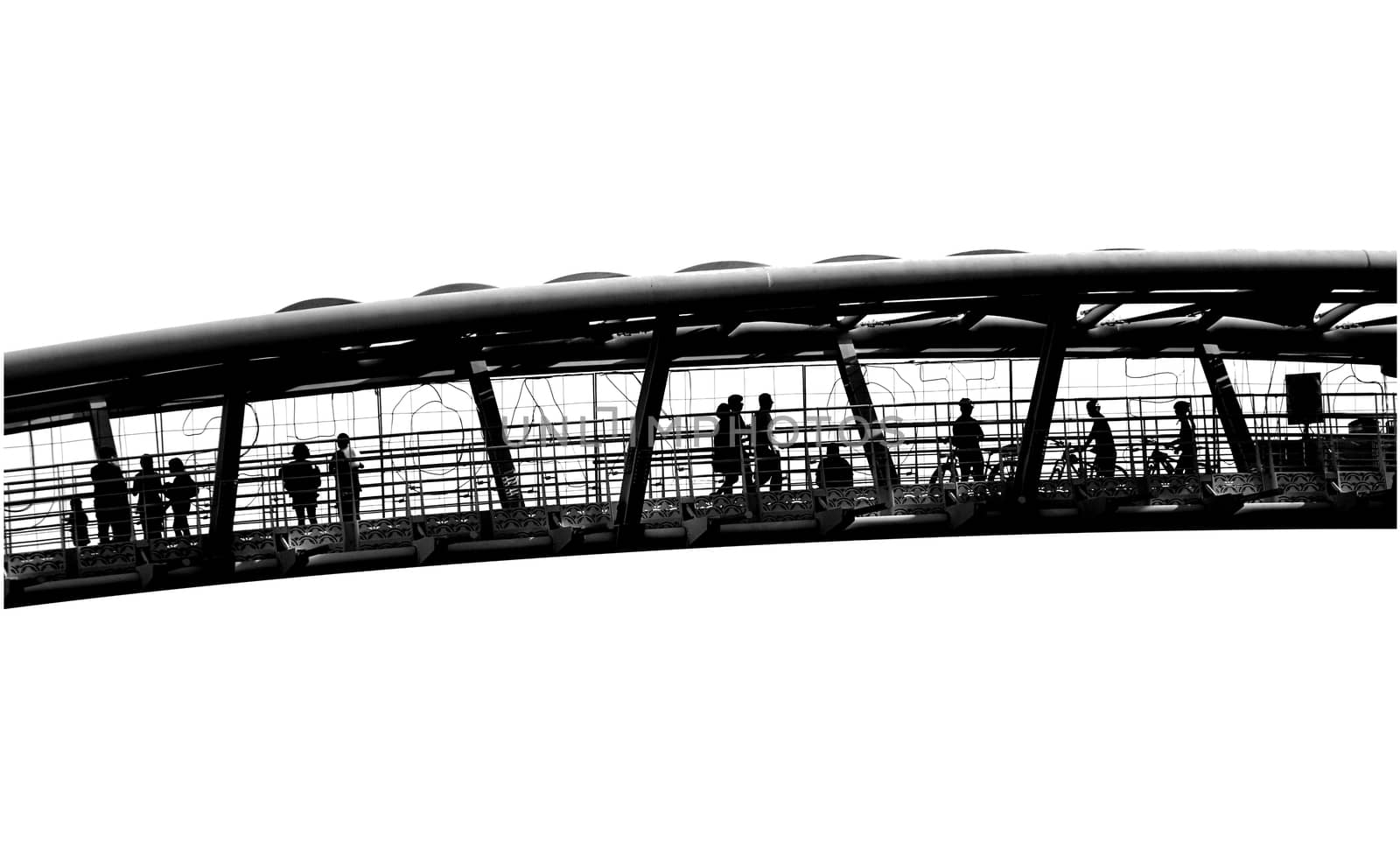 Outline silhouette of pedestrians on a bridge