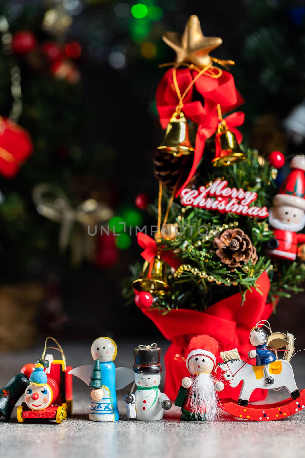 Christmas background with decorations and gift boxes on wooden