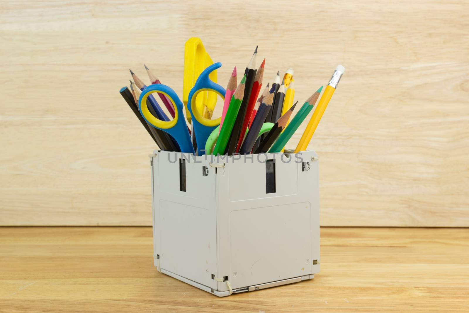 recycle floppy disk, Creative objects used for Store supplies such as pen pencils Scissors in a box on the table in work office, concept recycle floppy disk 