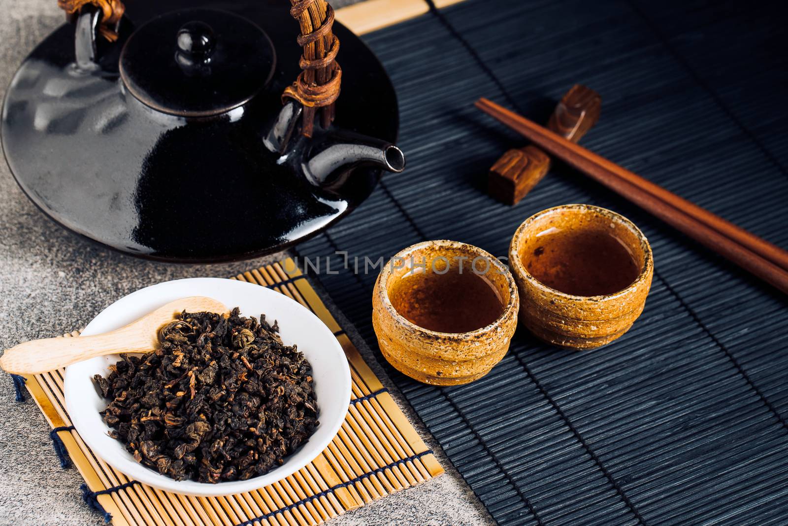 Hot tea in glass teapot and cup with steam by freedomnaruk