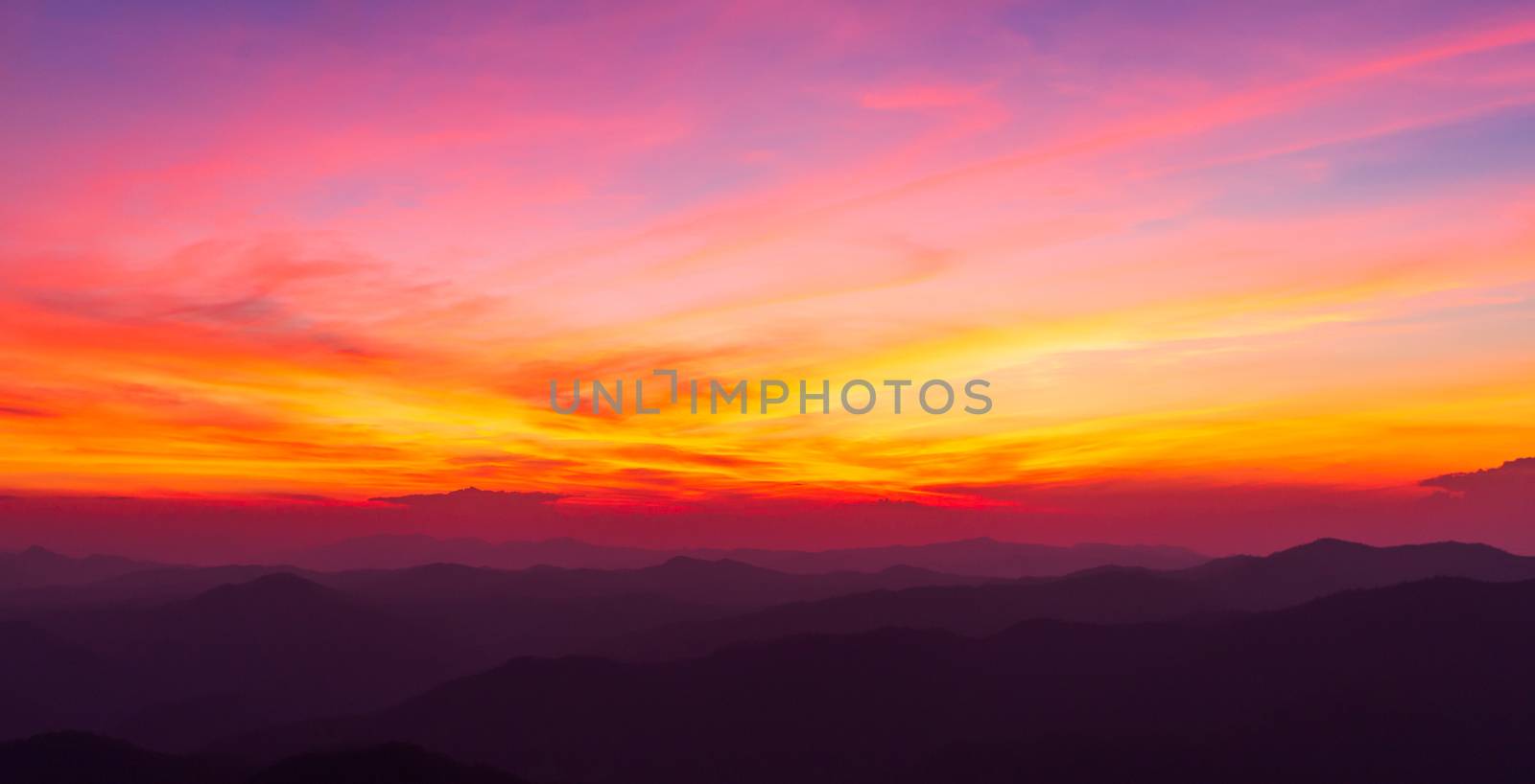 colorful dramatic sky with cloud at sunset