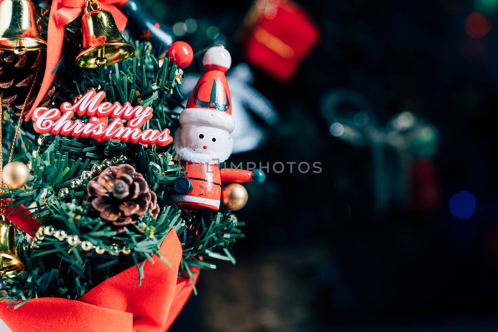 Christmas background with decorations and gift boxes on wooden