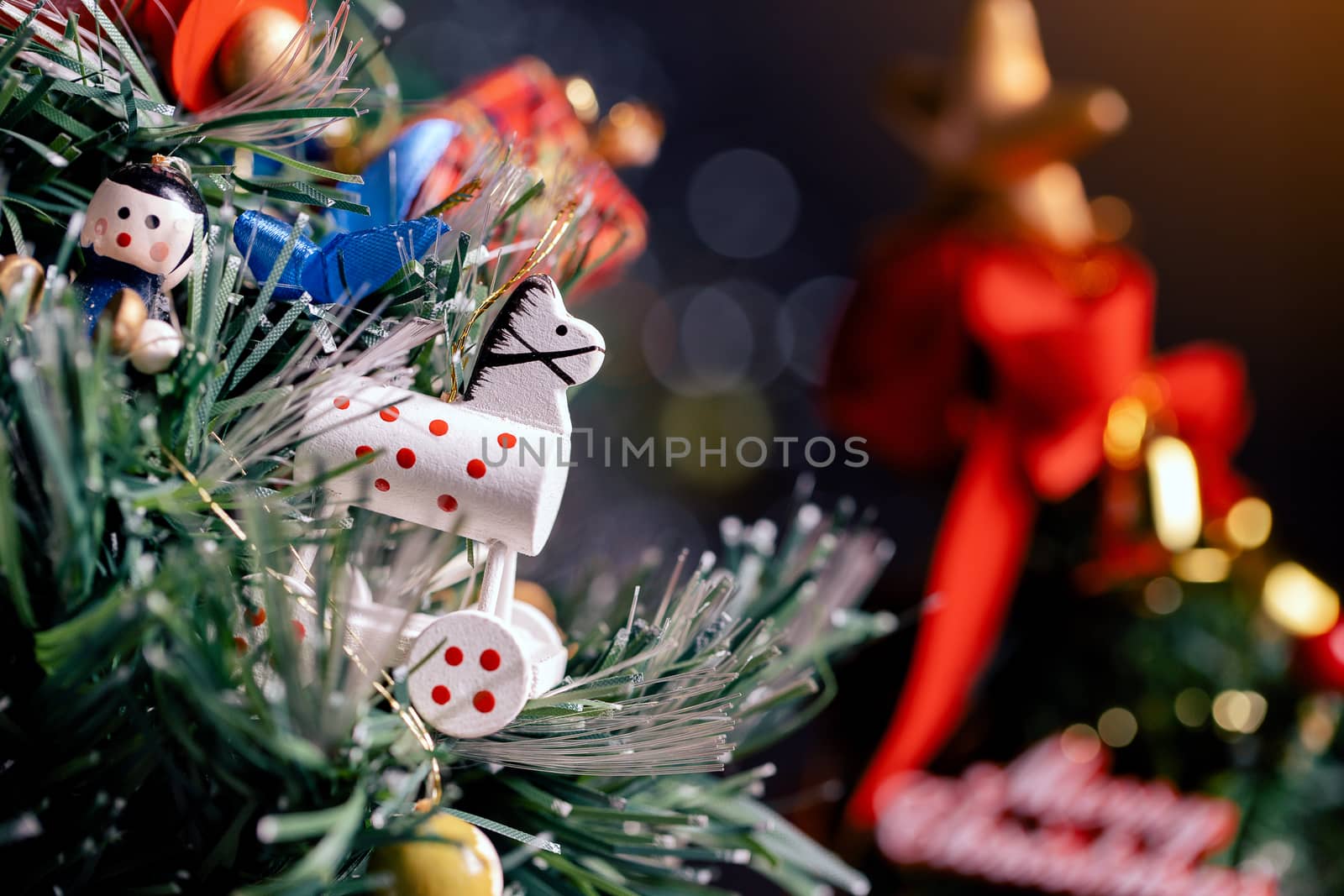 Christmas background with decorations and gift boxes on wooden