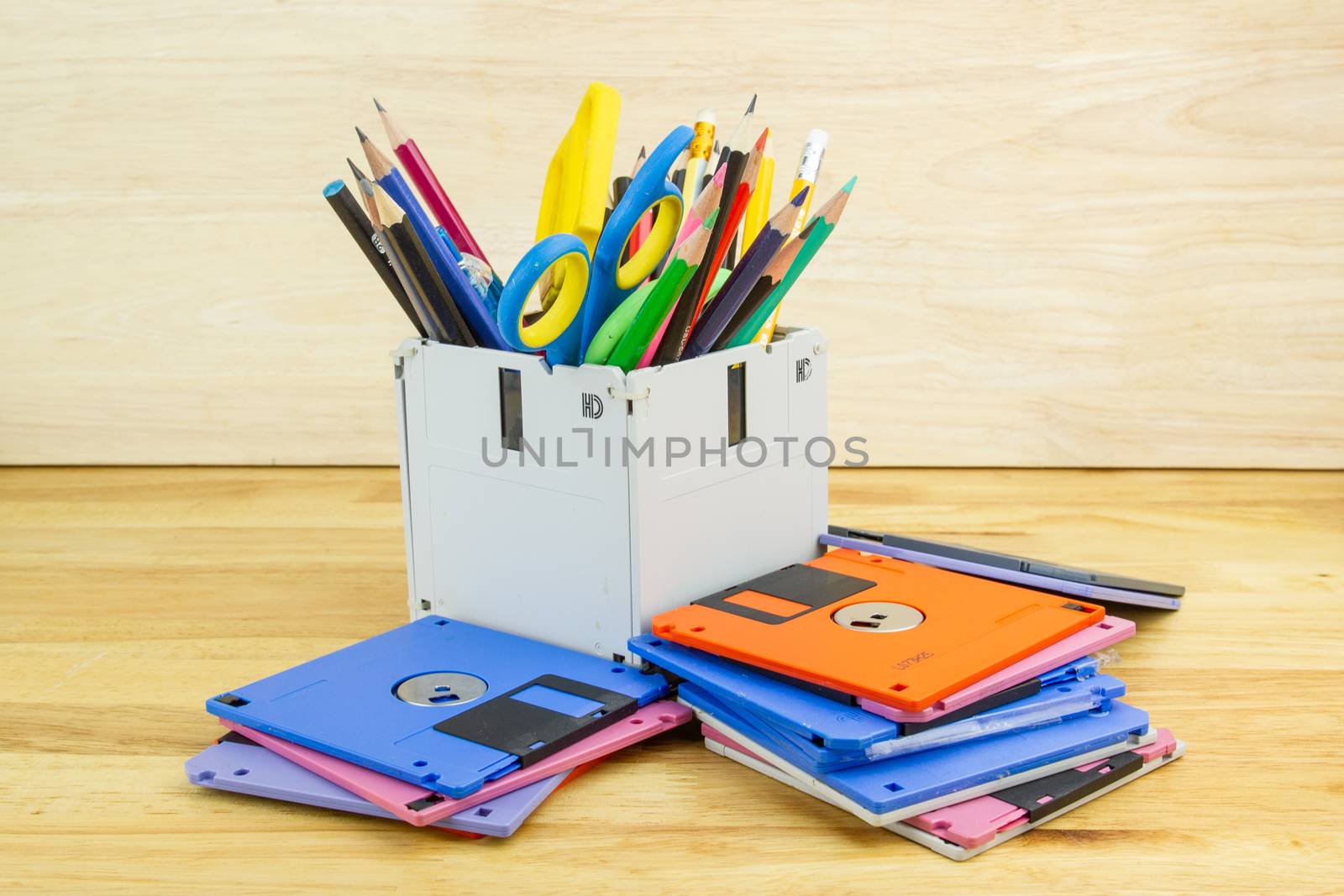 recycle floppy disk, Creative objects used for Store supplies such as pen pencils Scissors in a box on the table in work office, concept recycle floppy disk 