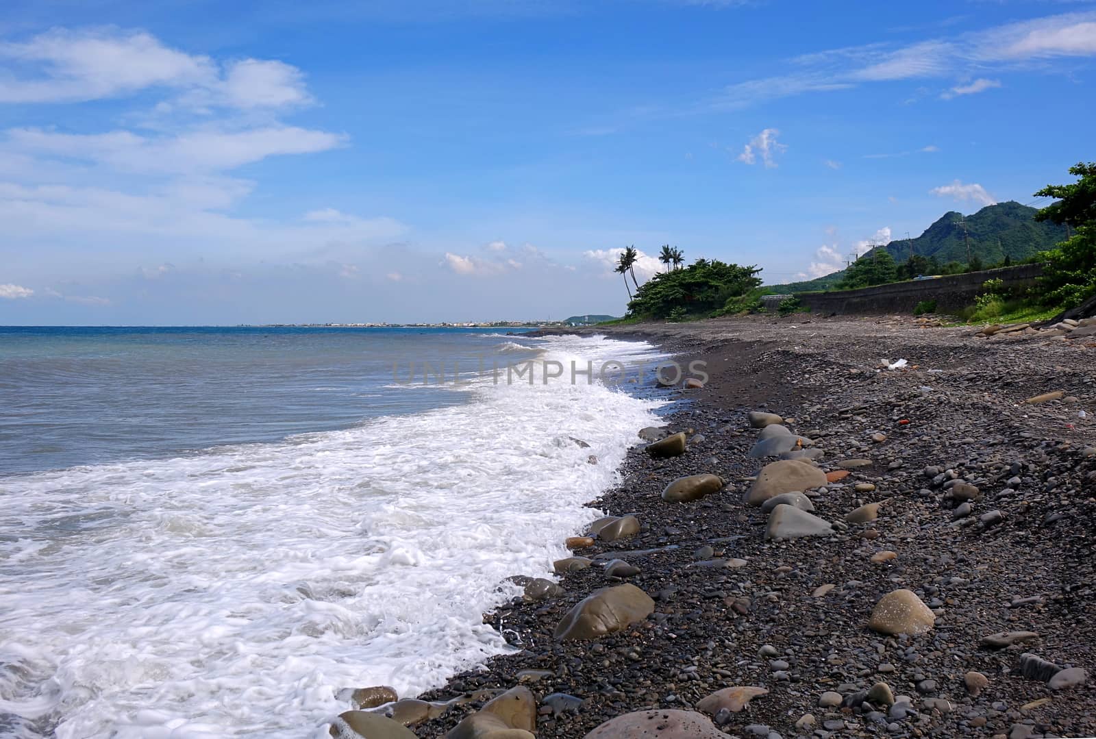 Rugged coastline with rocks and surf in southern Taiwan
