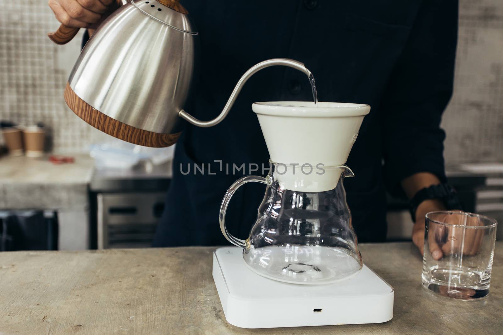 Barista brewing coffee, method pour over, drip coffee