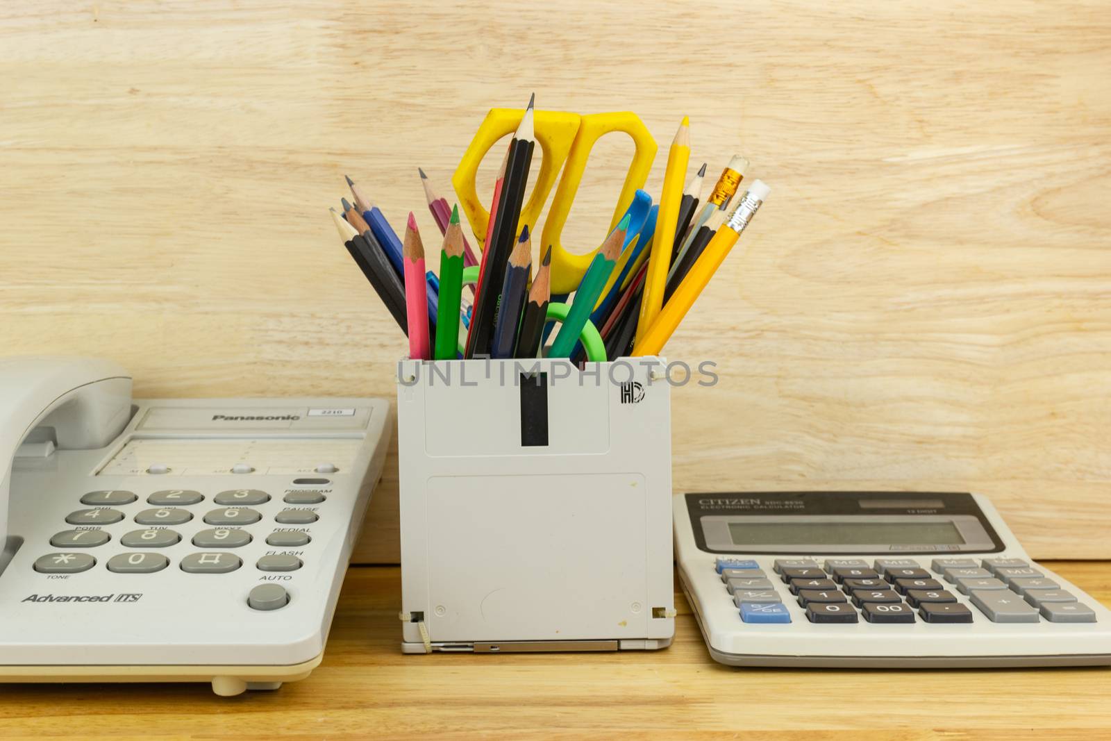 recycle floppy disk, Creative objects used for Store supplies such as pen pencils Scissors in a box on the table in work office, concept recycle floppy disk 