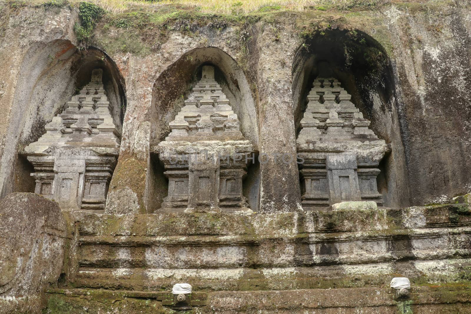 Udayana Dynasty Royal Tombs. Ancient royal tombs at Gunung Kawi Temple. Funeral complex centered around royal tombs carved into stone cliffs in the 11th century. Bali, Indonesia.