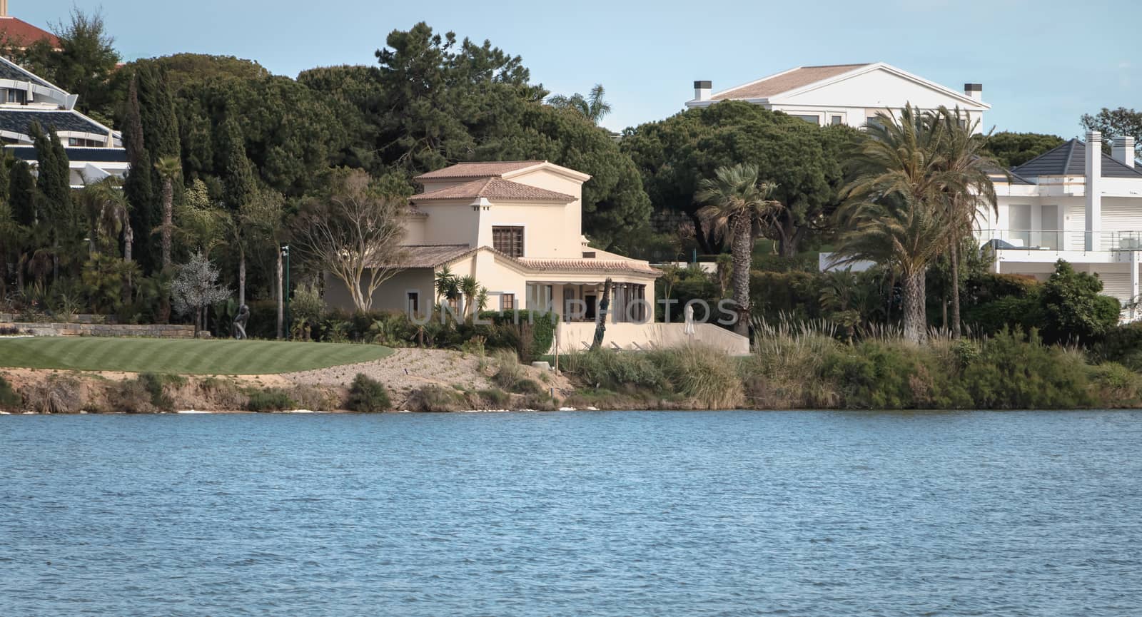 view of a luxury villa around the lake of Quinta do Lago, Portug by AtlanticEUROSTOXX