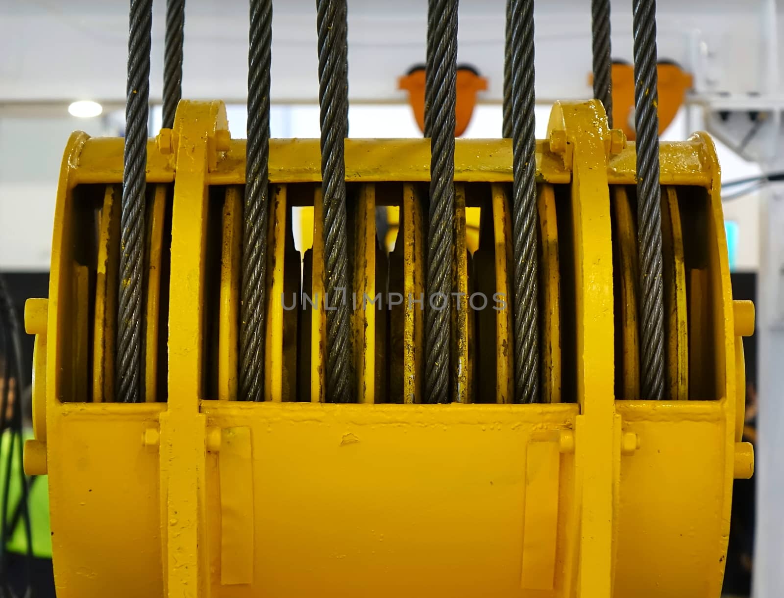 A large winch with rolled up steel cables