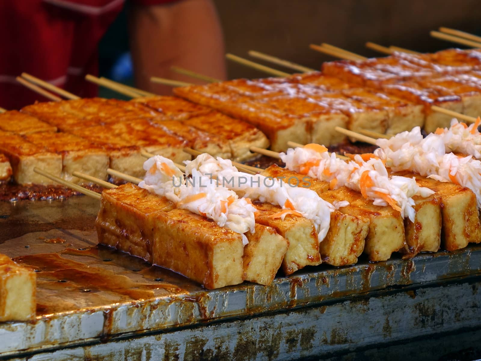 Stinky fermented tofu with pickled cabbage and hot sauce is popular in Taiwan