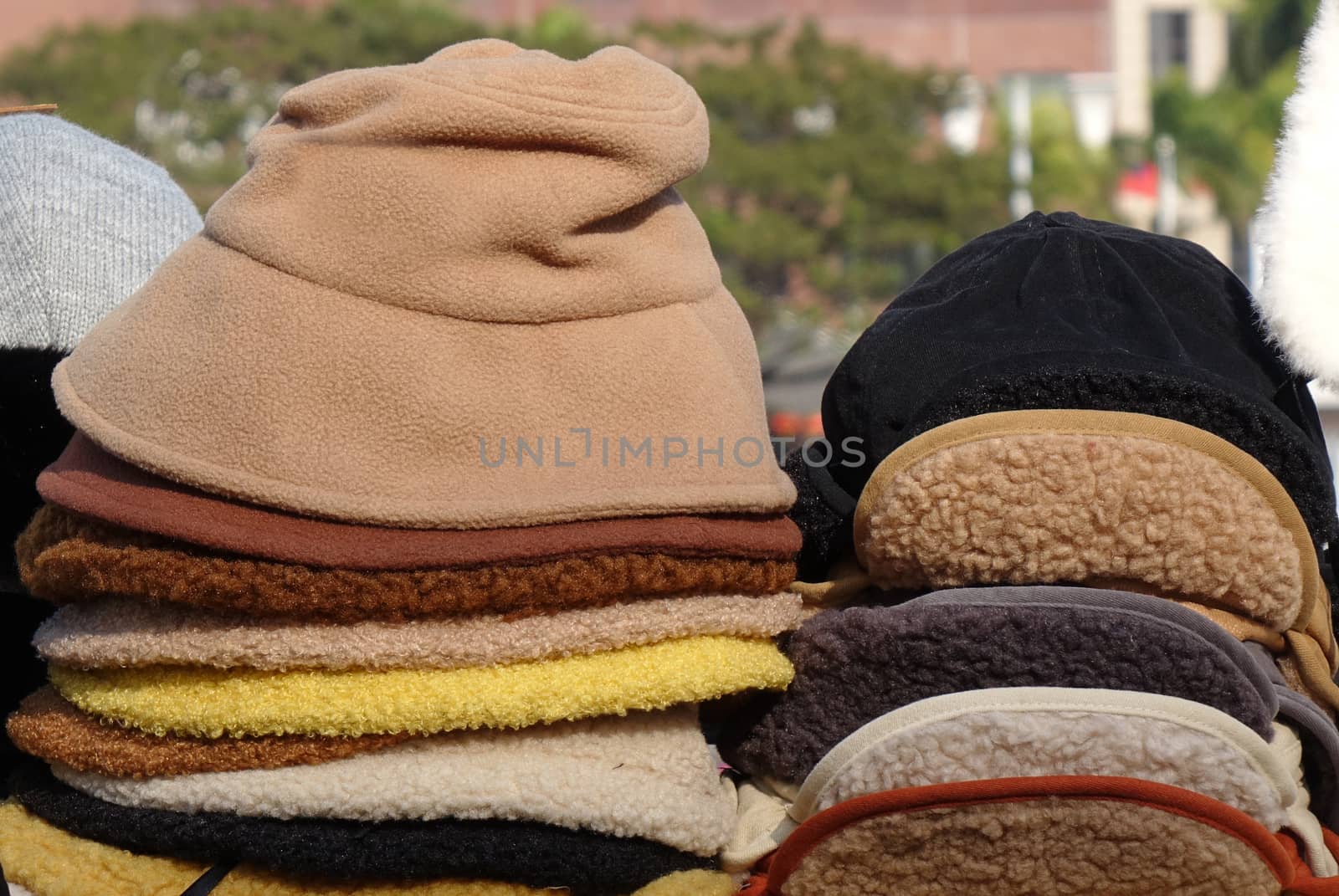 A street vendor in Taiwan sells warm hats for winter
