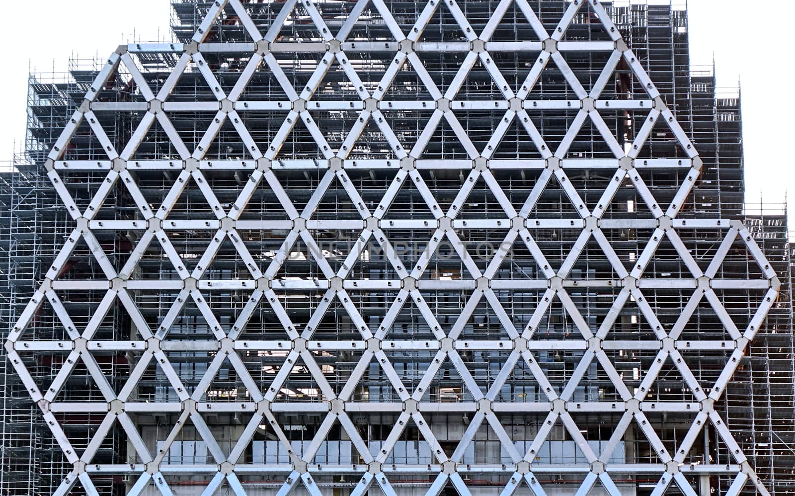 Large scale construction project with a modern steel facade