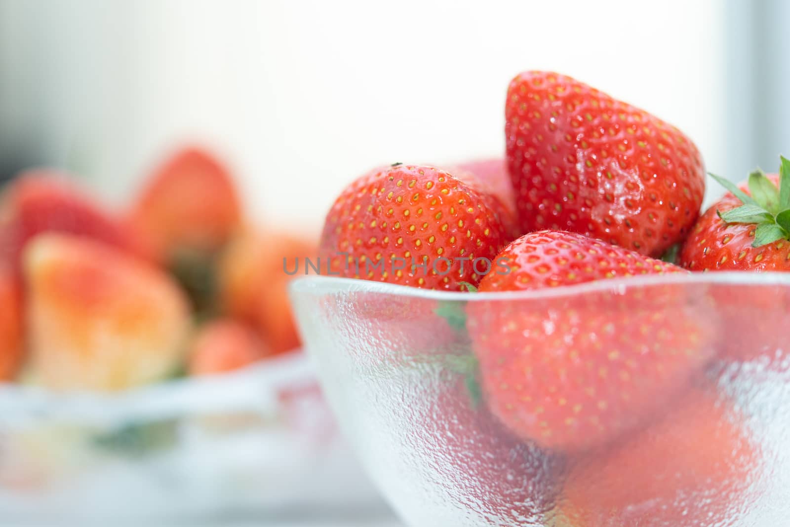 Strawberry is red fresh berry fruit color and sweet juicy for sale at Thai street food and fruit market in concept food and fruit, healthy eating in life