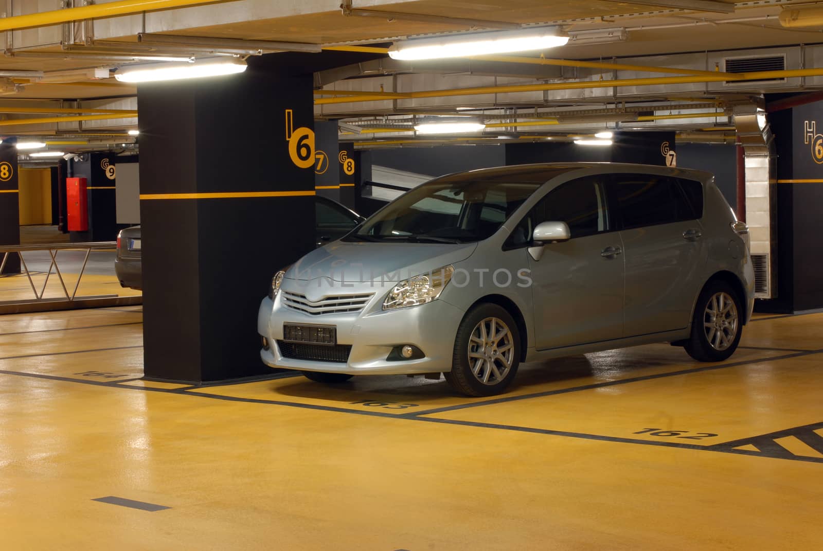 the car is parked in the underground garage