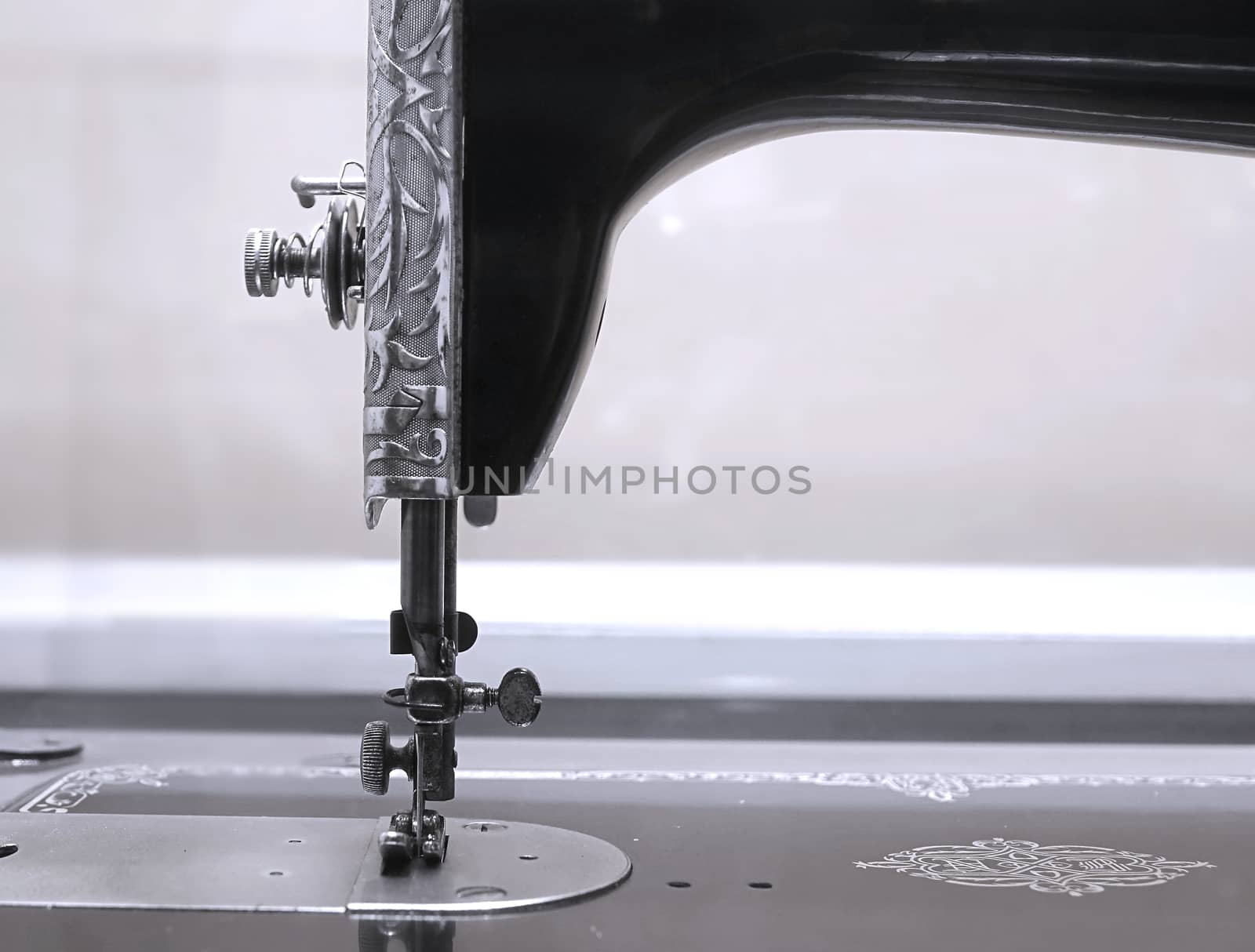 Detail view of an old-fashioned sewing machine