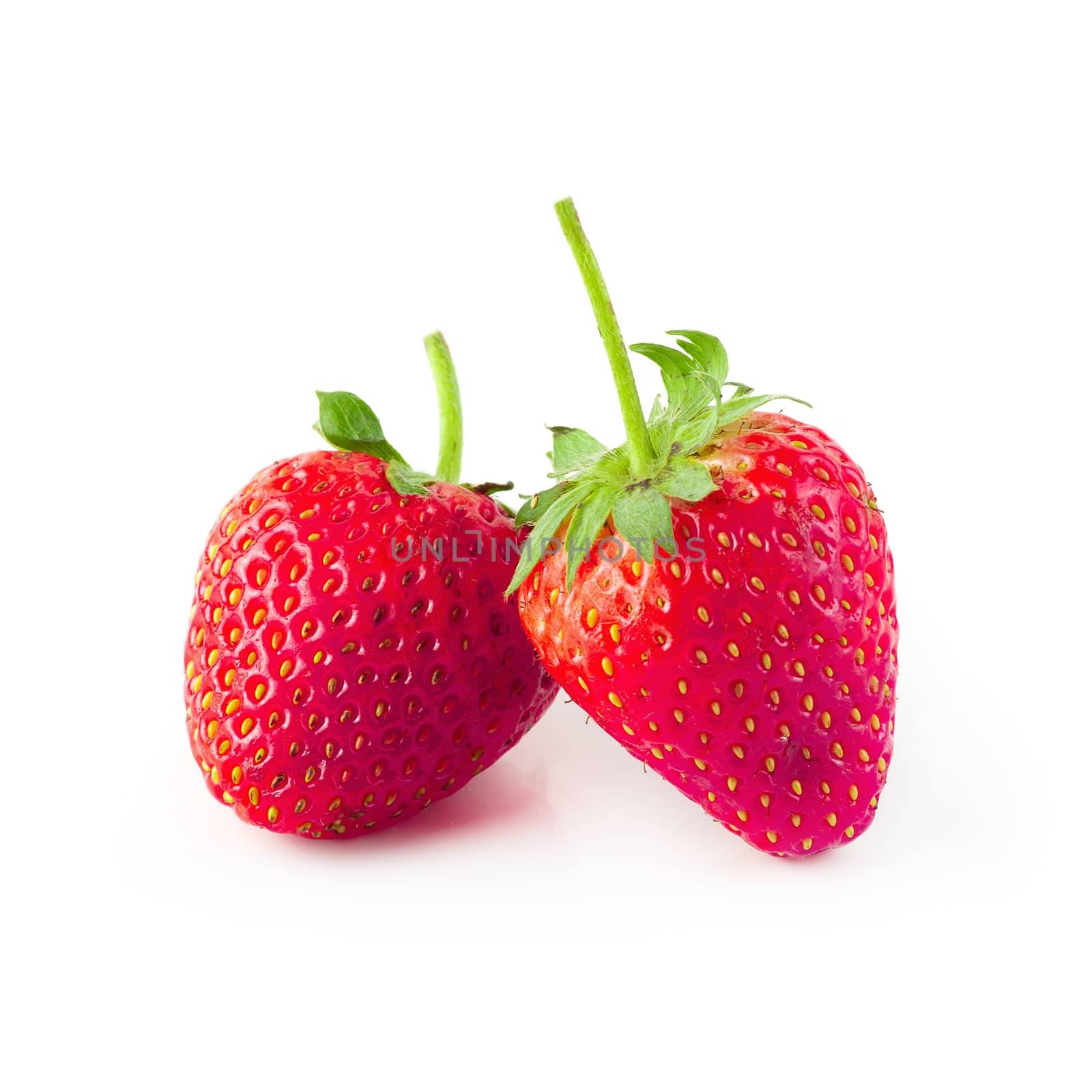 Fresh strawberries isolated on a white background.