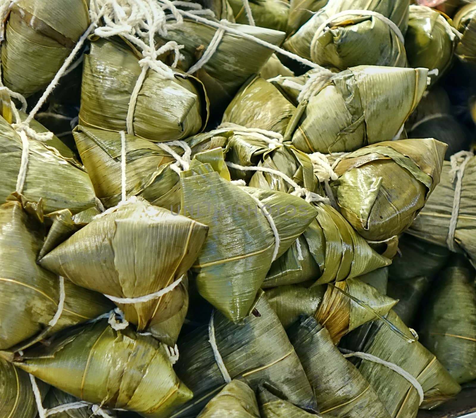 Chinese sticky rice dumplings (Zongzi) wrapped in leaves