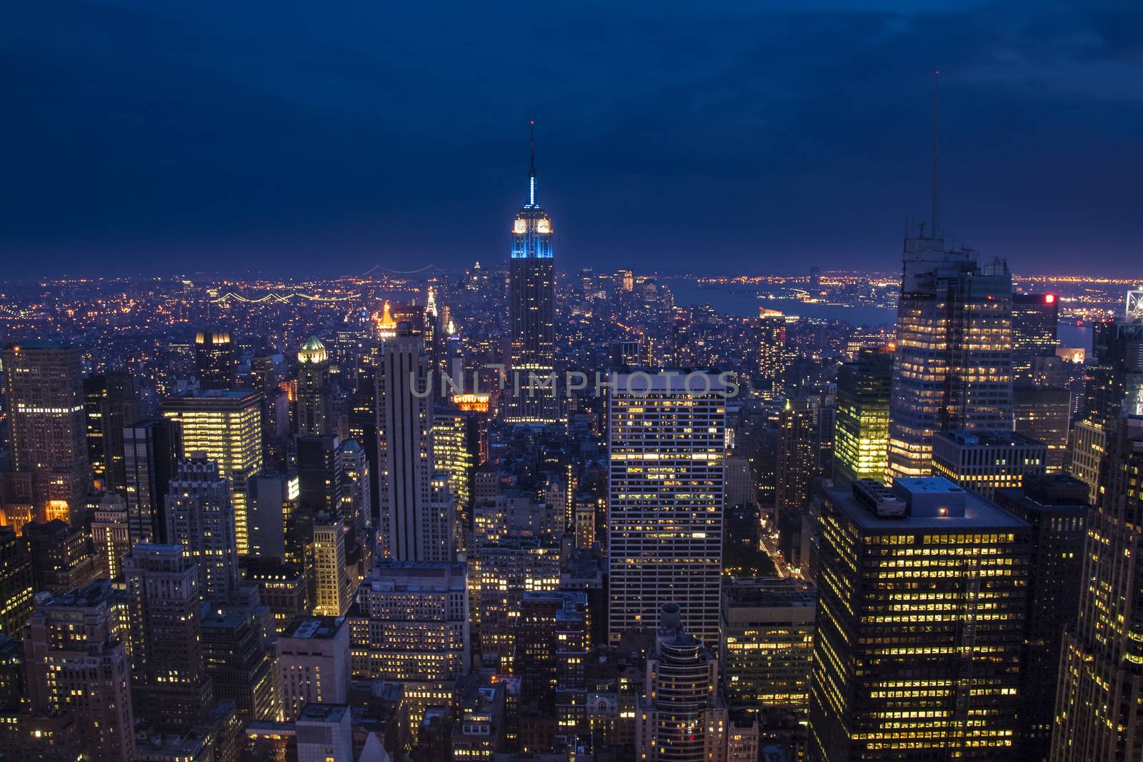 New York City with skyscrapers in the blue hour. The amazing Big Apple in USA.