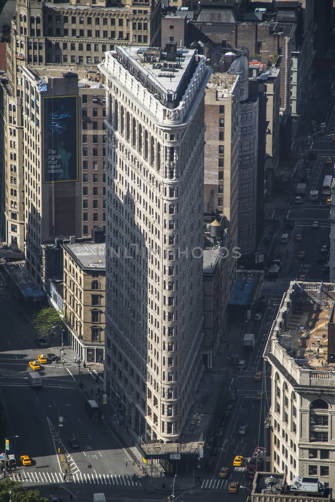 Aerial view of the streets of New York City including the Flatiron building by tanaonte