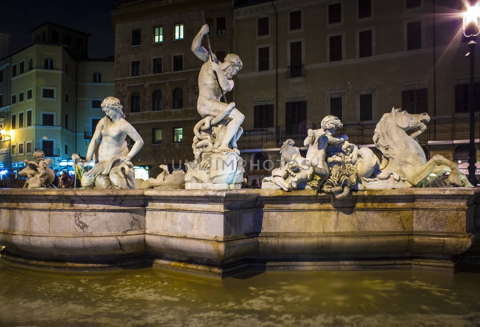 Piazza Navona is a square in Rome, Italy. It is built on the site of the Stadium of Domitian, built in 1st century AD. Fountain of the Moor or Fontana del Moro .Italy.