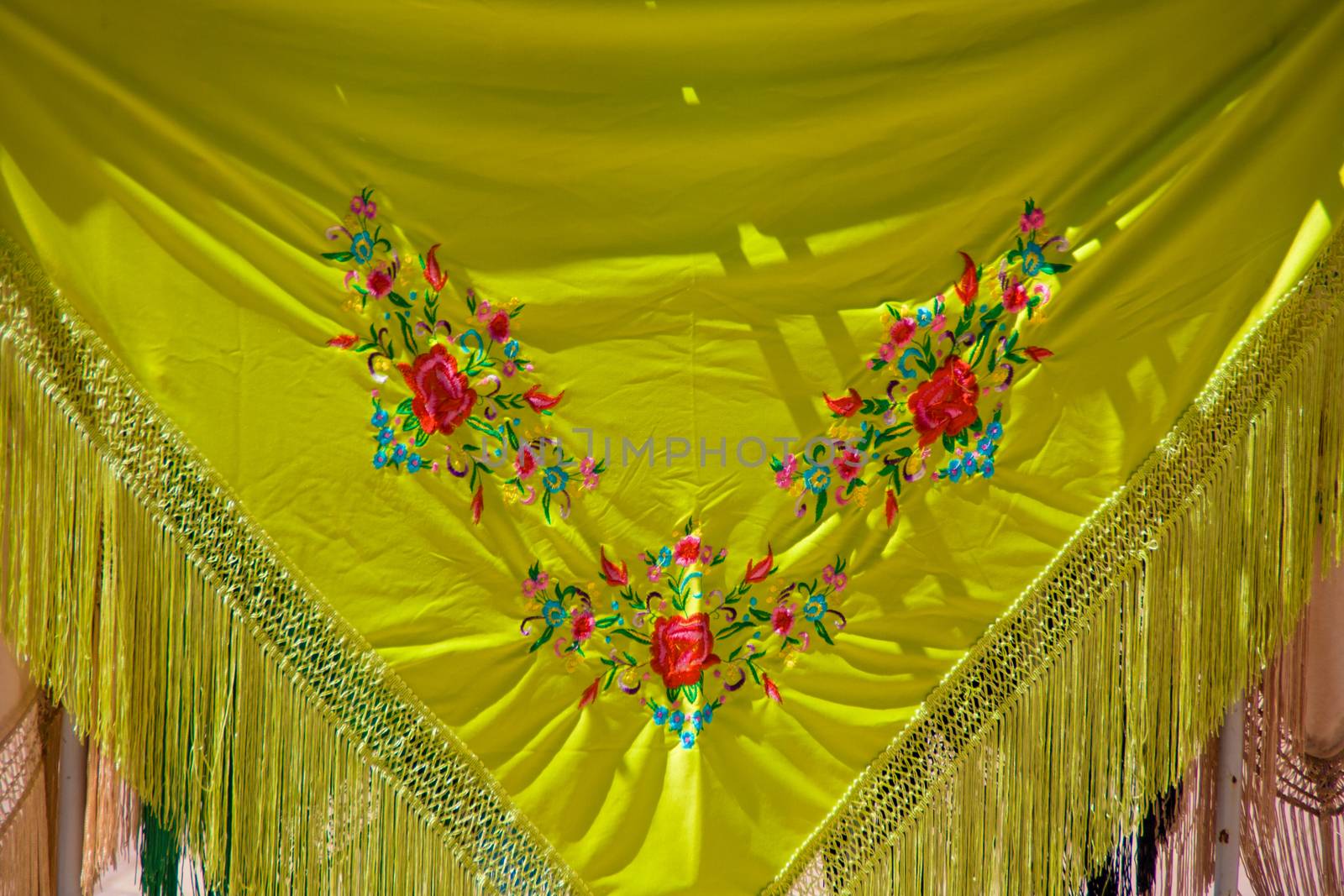 Close up view of Manila shawl in Seville, Andalucia. Vintage spanish clothes in fairs and festive daysManila shawl. Vintage spanish clothes in fairs and festive days