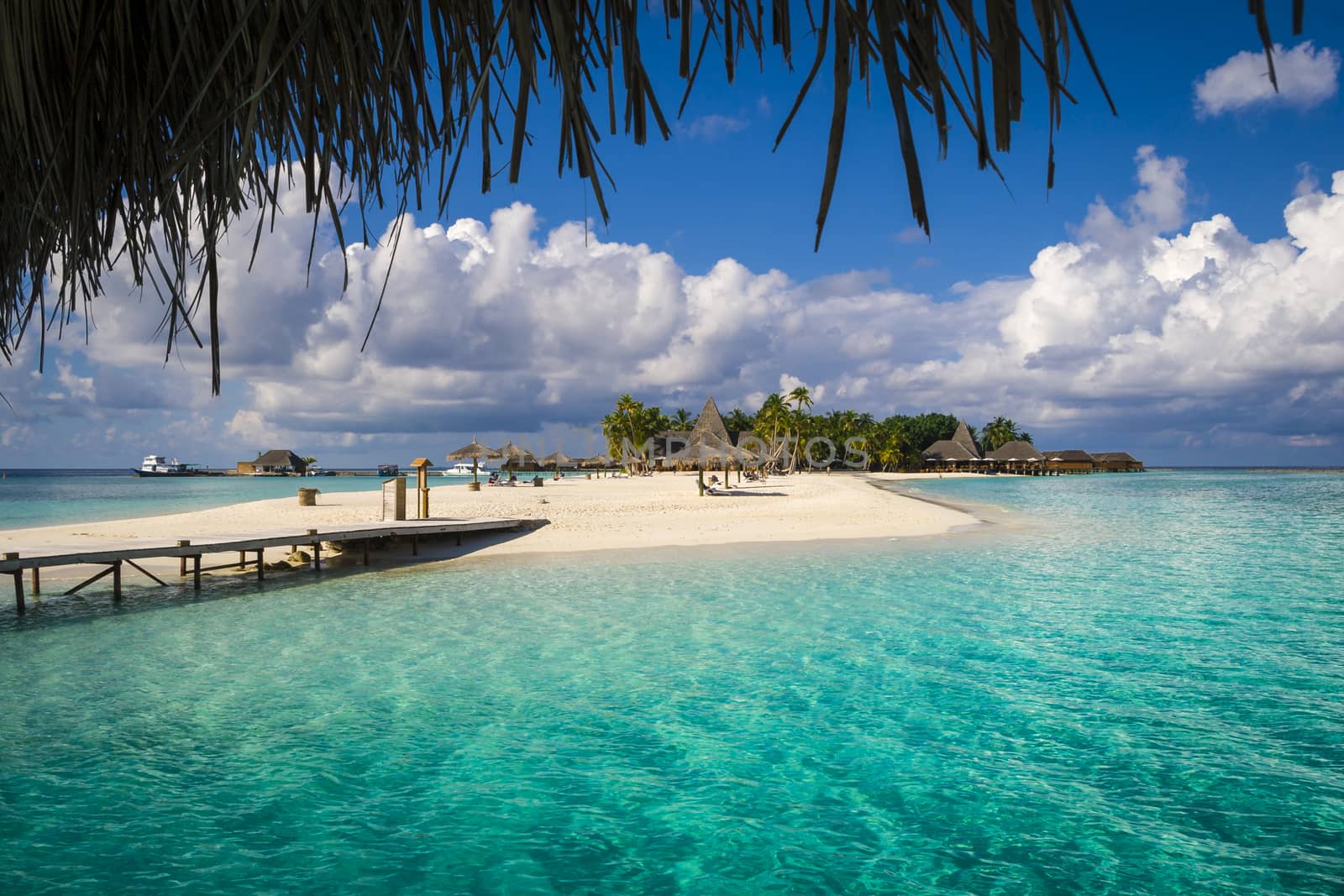 a Maldives tropical island and turquoise water. Suitable for an idea of vacations, Caribbean or tropical summer time.