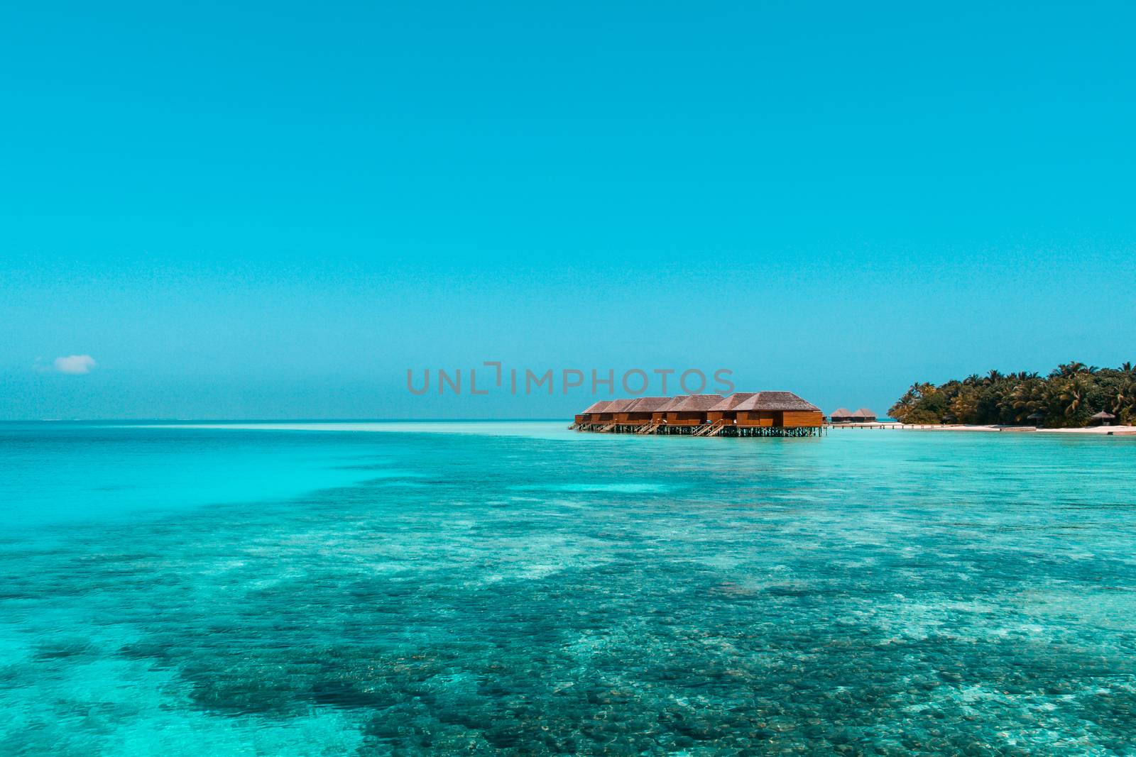 Beautiful beach with water bungalows or water villas at Maldives