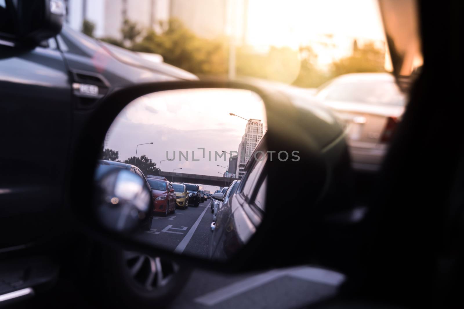 Cars on busy road in the city with traffic jam by PongMoji