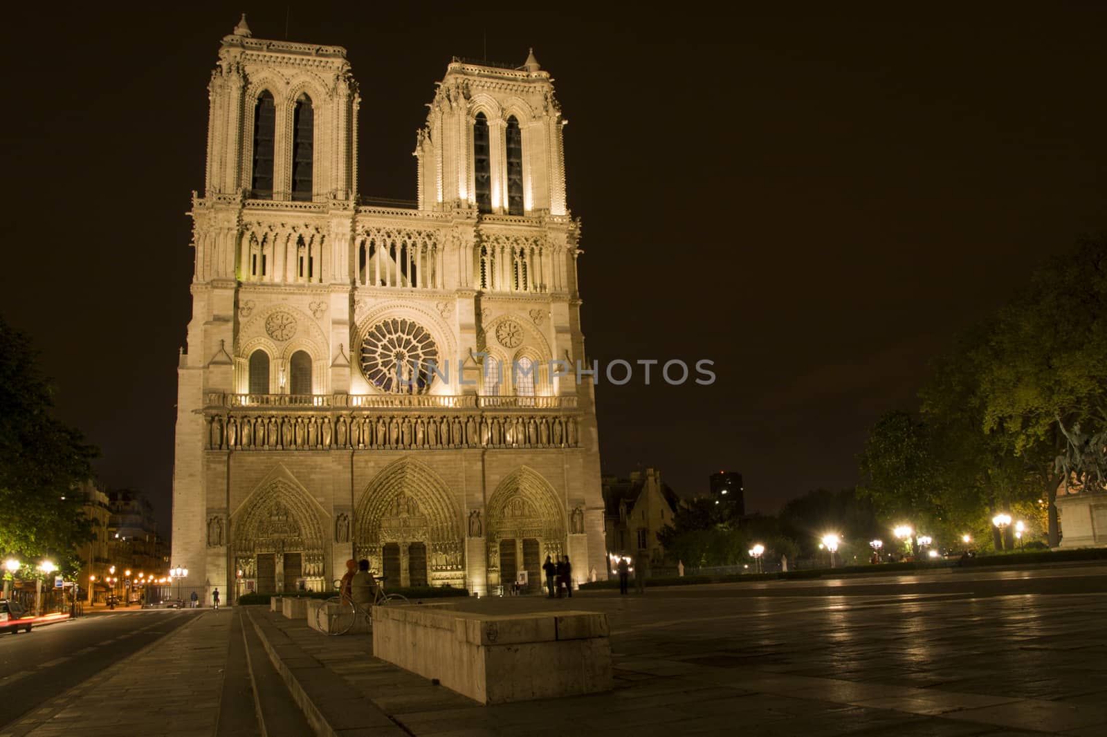 Quiet night scene of Notre Dame cathedral in Paris.