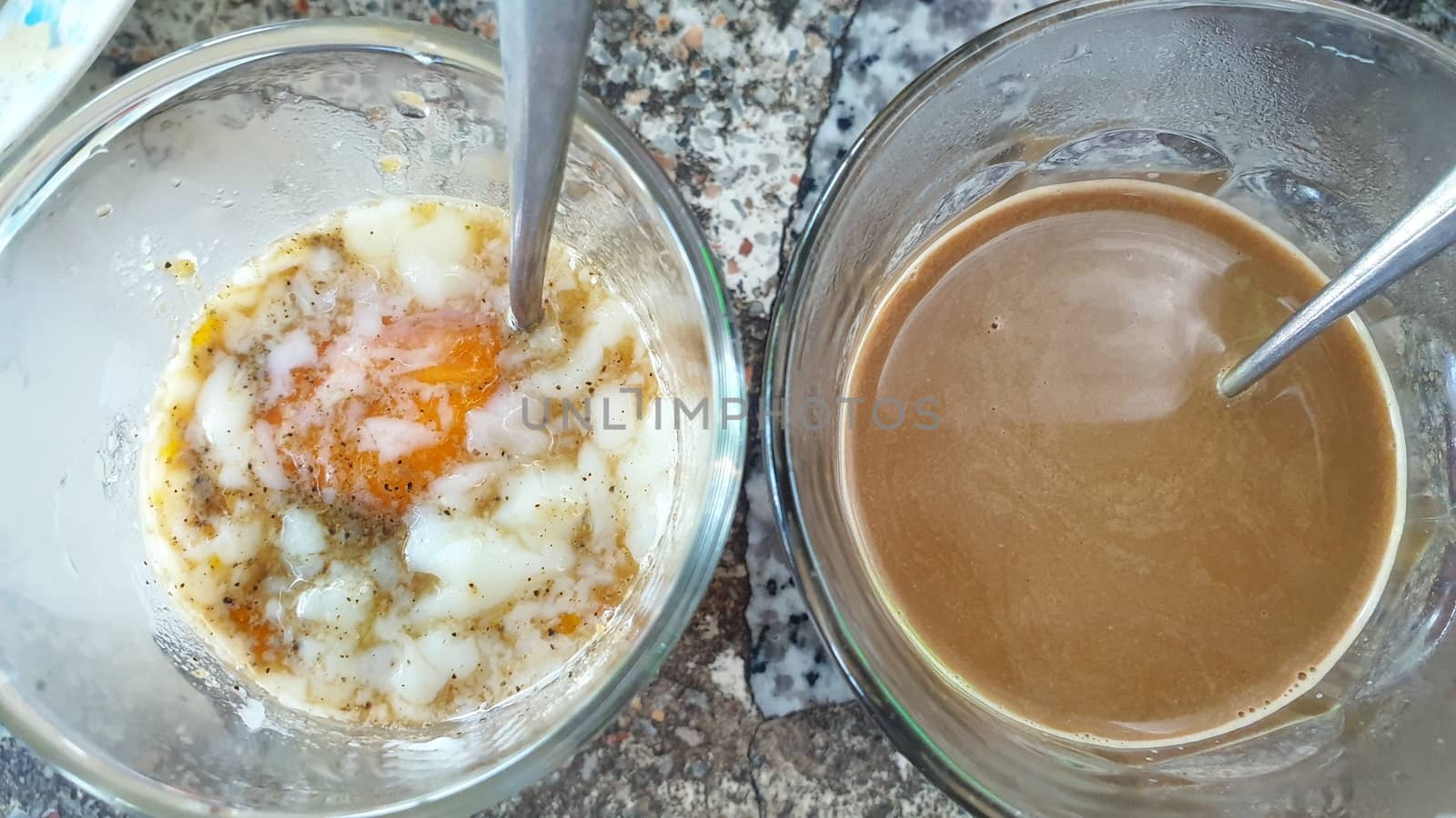 Breakfast food with soft-boiled eggs and vintage coffee Thai style for sale at Thai street food market or Thai vintage style coffee shop restaurant in Thailand