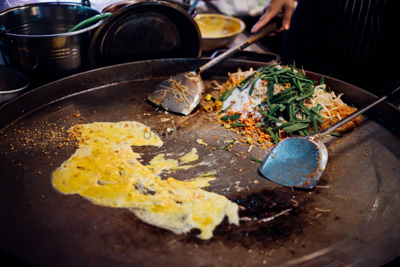 Fried noodle Thai style (Pad Thai) for sale at Thai street food market or restaurant in Thailand