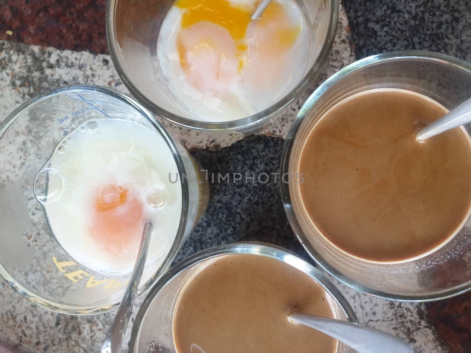 Breakfast food with soft-boiled eggs and vintage coffee Thai style for sale at Thai street food market or Thai vintage style coffee shop restaurant in Thailand