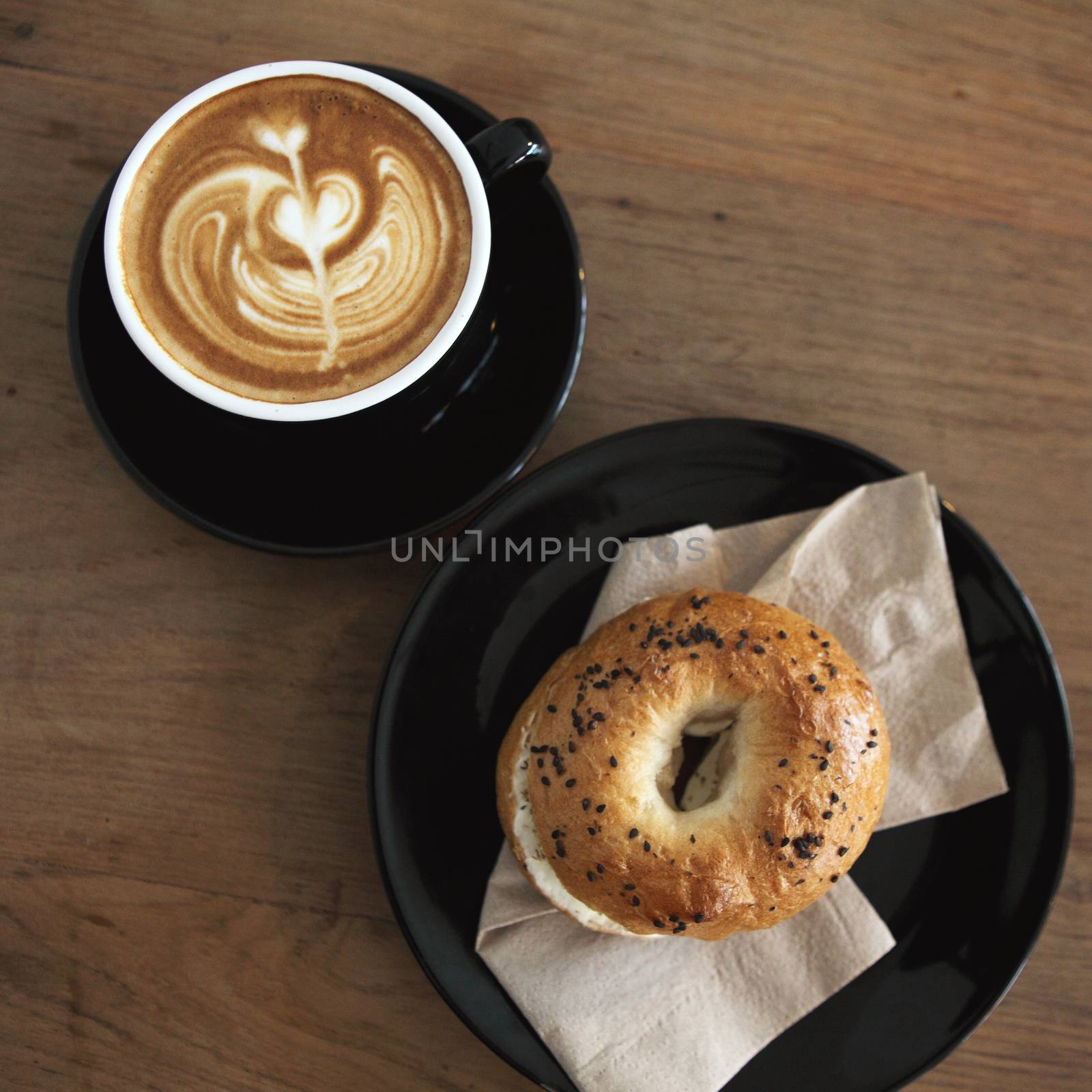 bagel with coffee by piyato
