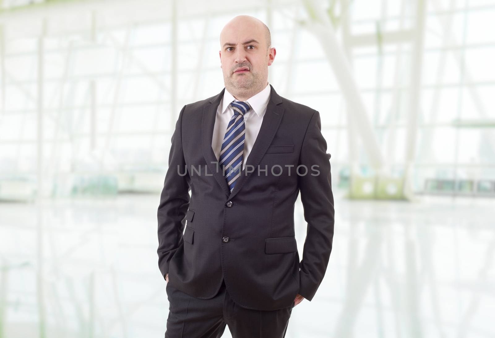 silly business man portrait at the office