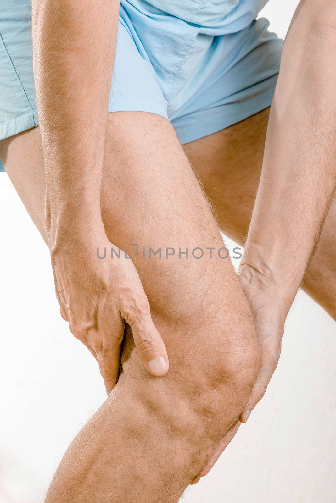 Athlete man feeling pain to the knee by MaxalTamor