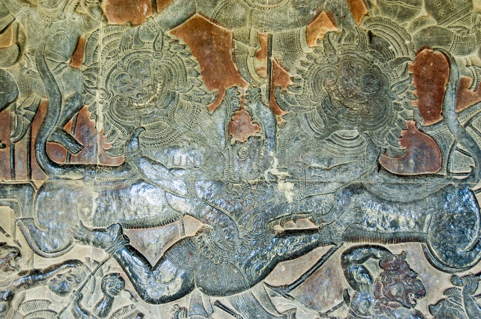 The Hindu monkey god Hanuman fighting two imperial lions in the Battle of Lanka. Wall of Angkor Wat temple, Angkor, Siem Reap, Cambodia.