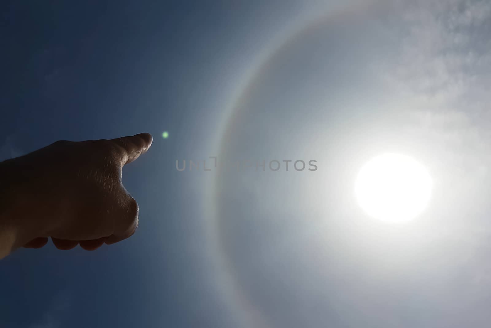 phenomenon of halo in the sky. A rare natural phenomenon. Three halo suns. by DePo
