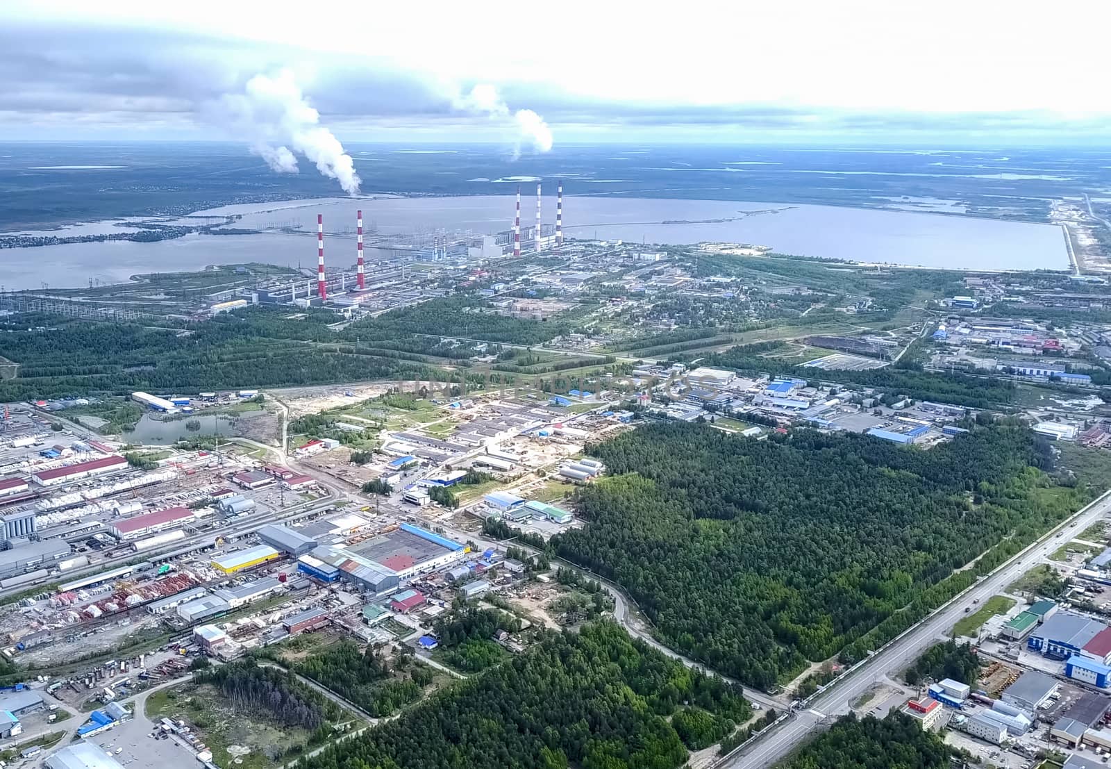 View from above on city of Surgut. Hunts-Mansi Autonomous Region, surgut city from a bird's-eye view. by DePo