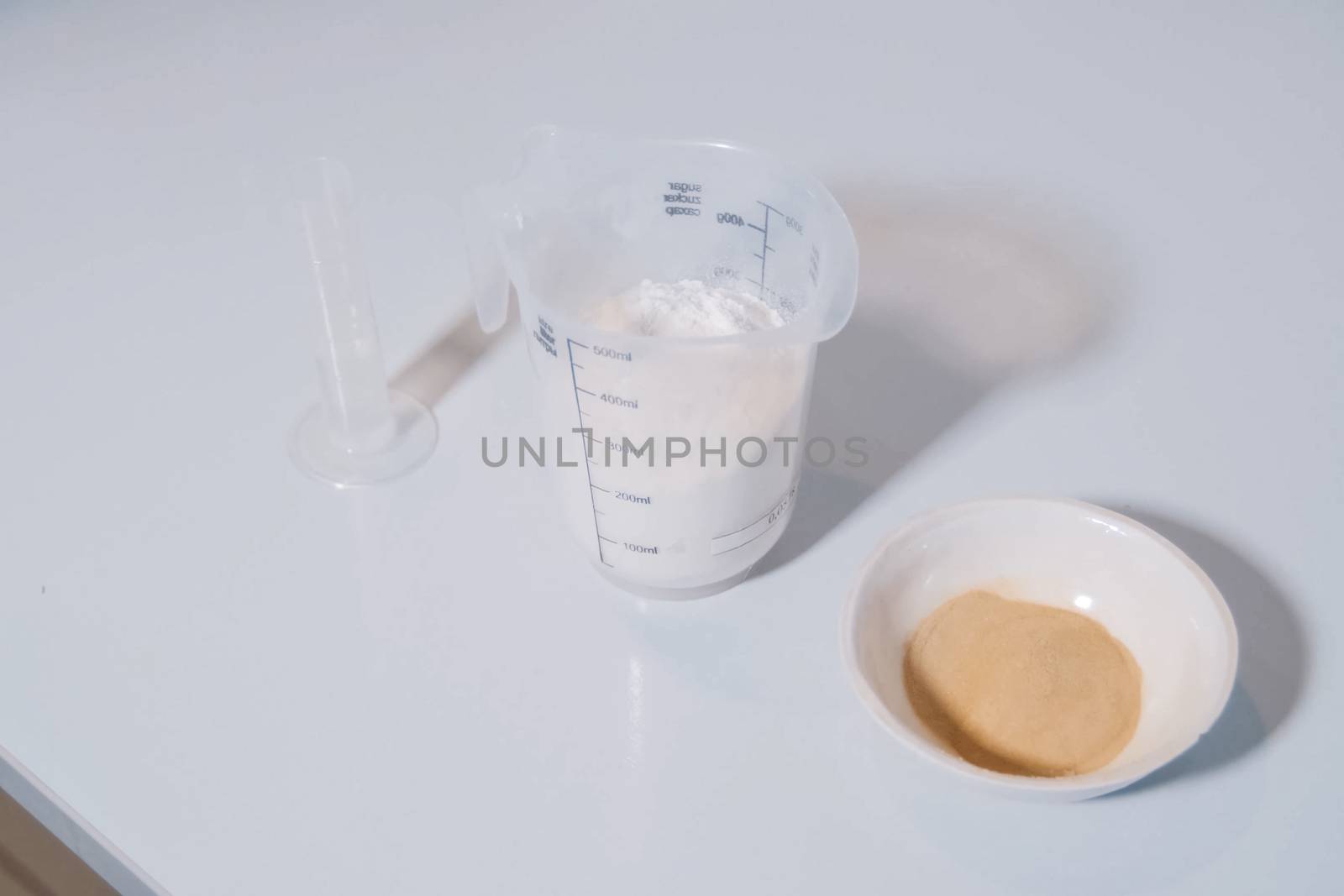 White powder in measuring glass. Distribution of proportions. by DePo