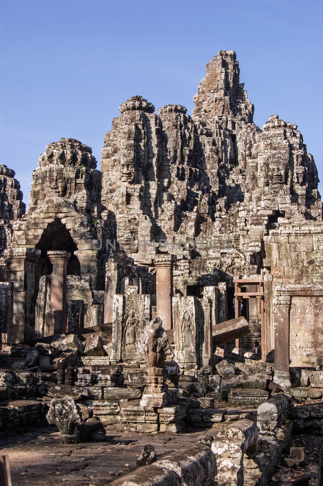 Bayon Temple, Angkor Thom, Siem Reap, Cambodia. Vertical view of the ancient Khmer Temple famous for the serene faces carved on its towers.
