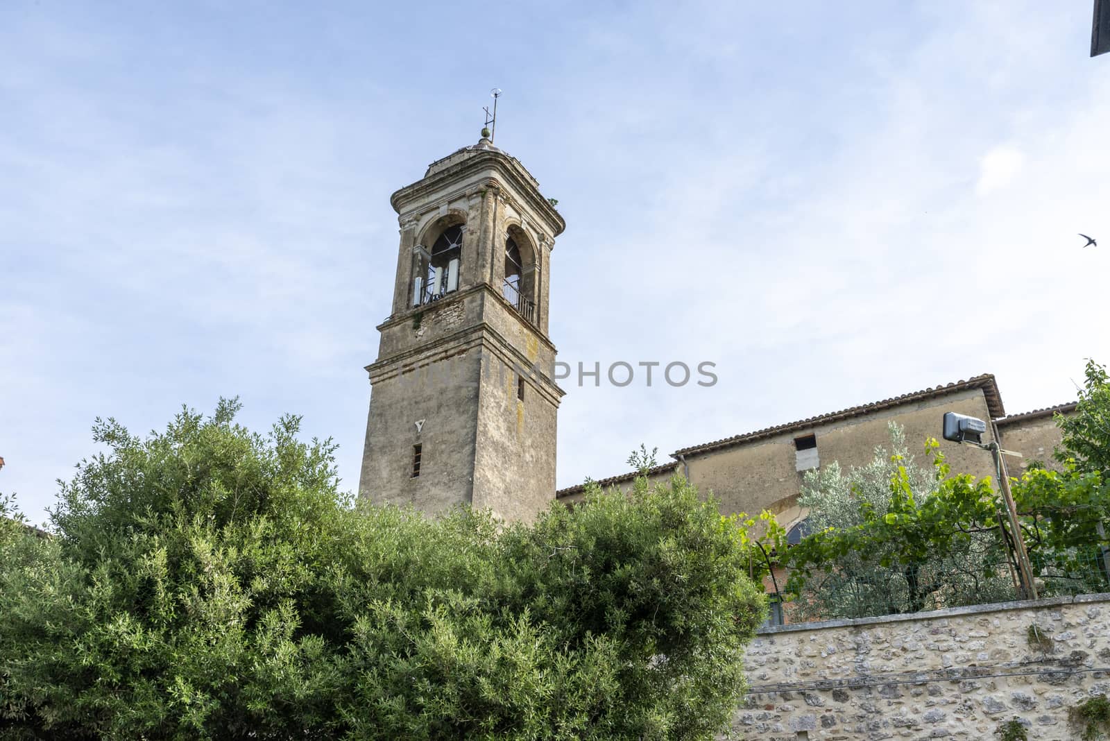 San Gemini, Italy June 13 2020: Bell tower of Santo Gemini in the town of San Gemini medieval age