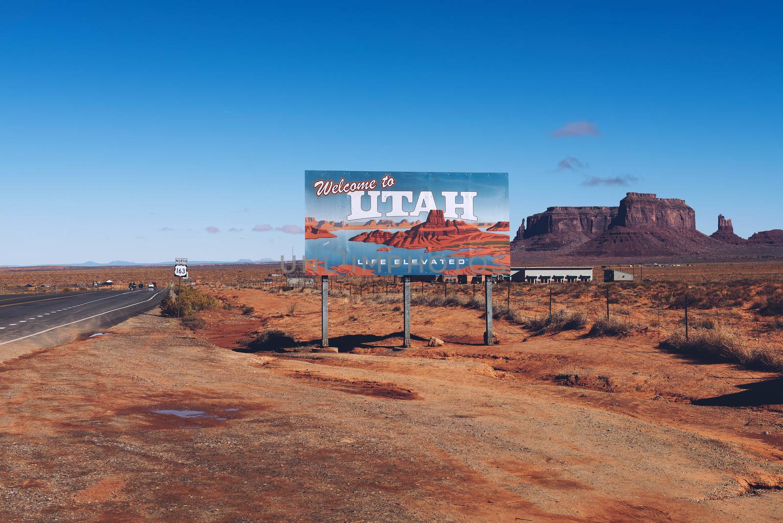 Oljato - Monument Valley, Utah, USA - October 19, 2018 : Welcome to Utah State Sign situated along US-163 at the border with Arizona near Monument Valley.