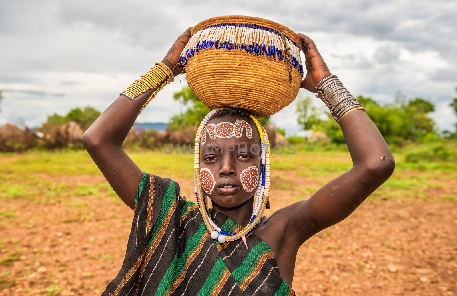 Young boy from the African tribe Mursi, Ethiopia by nickfox