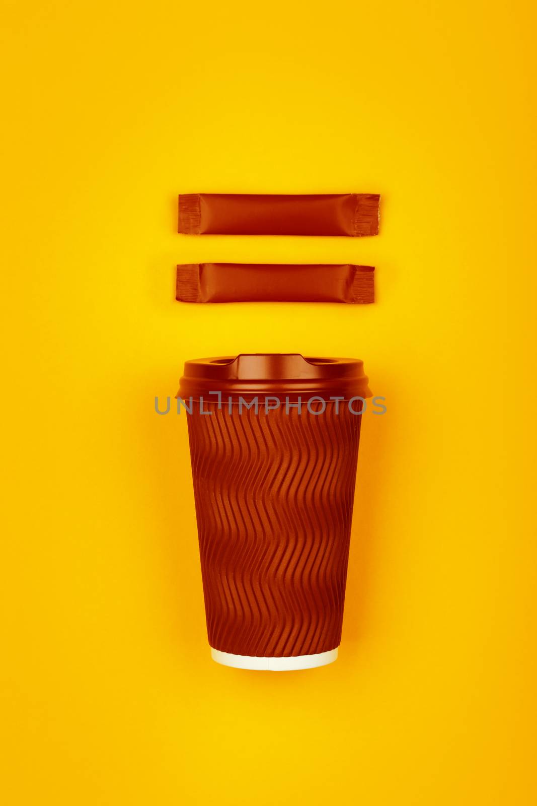 Brown paper coffee cup over yellow by BreakingTheWalls