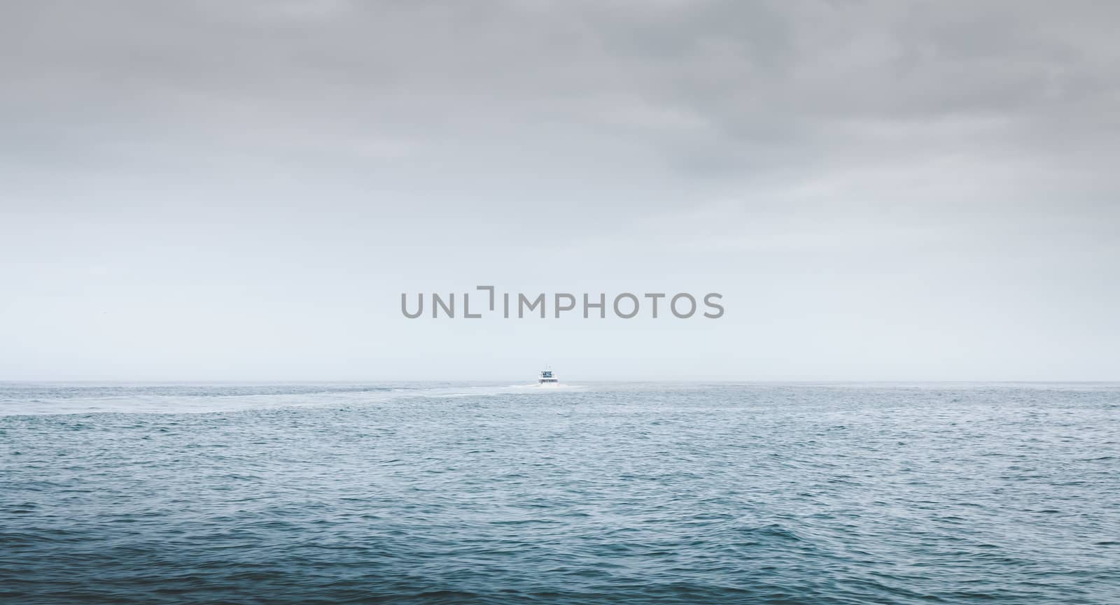 Port Joinville, France - September 18, 2018: Shuttle ferry boat leaving Port Joinville Yeu Island on a summer day