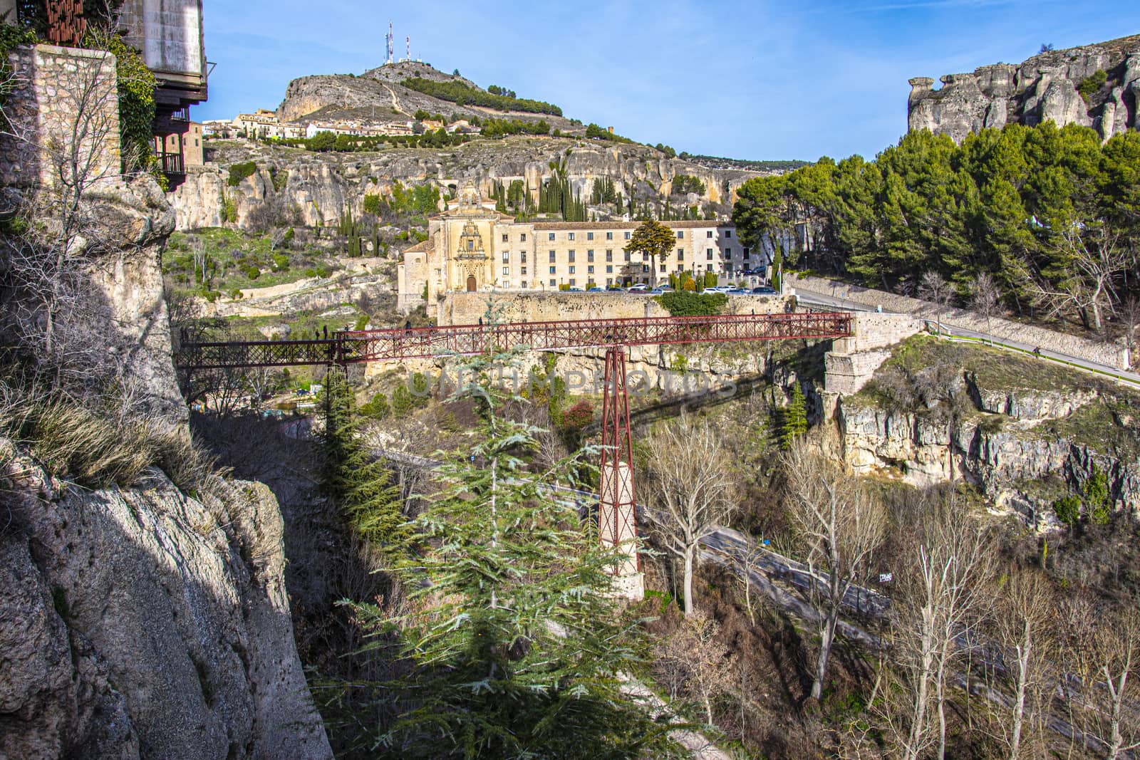 panoramic view of old monastery and metal bridge between precipices in the historic city of Cuenca. Spain