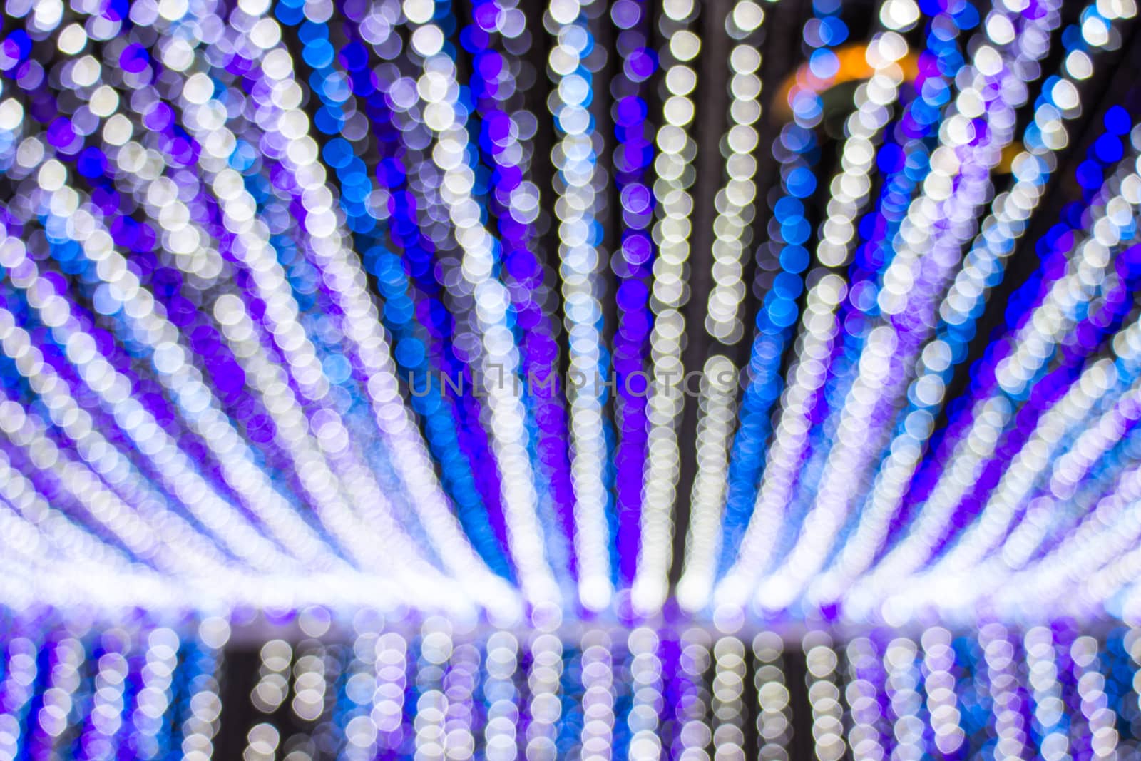 Blur bokeh christmas decoration of colorful background.