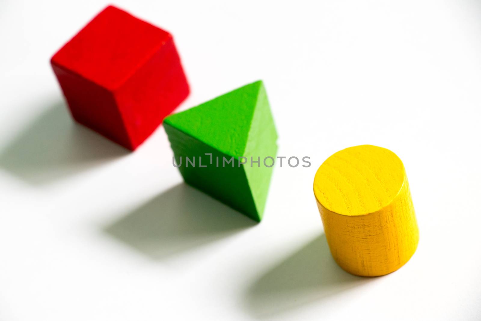 Set of colorful wooden shape toy (Square, triangle, round) on white background