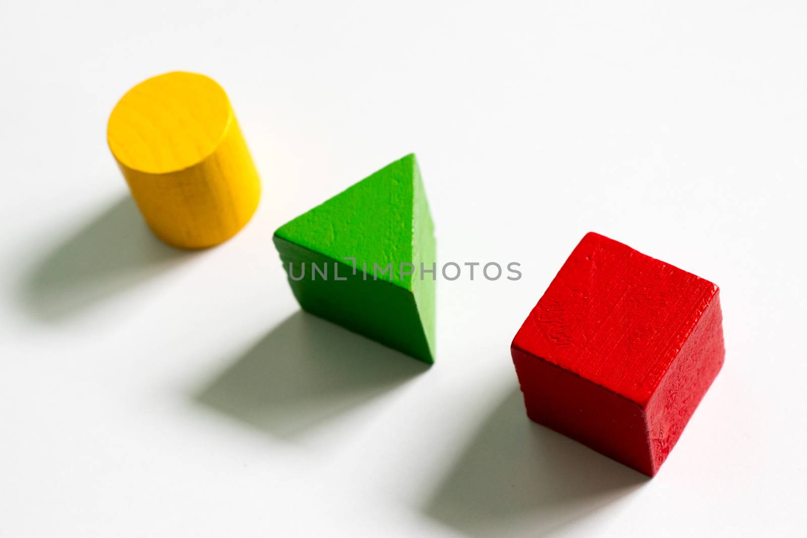 Set of colorful wooden shape toy (Square, triangle, round) on white background